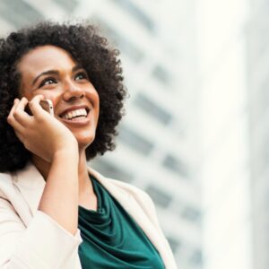 happy-businesswoman-talking-phone (1)